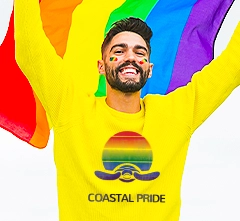 pride rainbow design on a yellow long sleeve